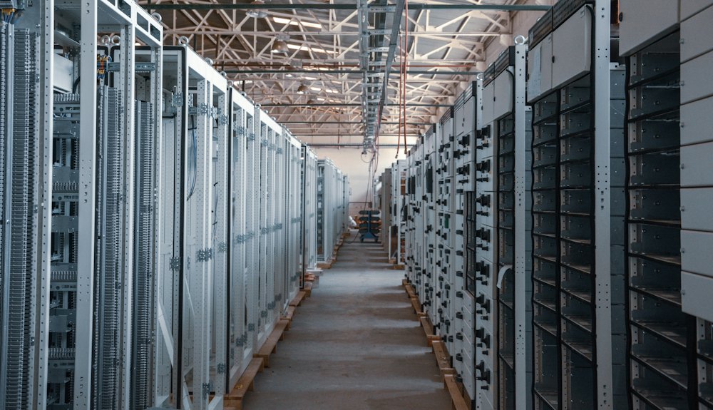 Aisle of equipment racks inside a data center