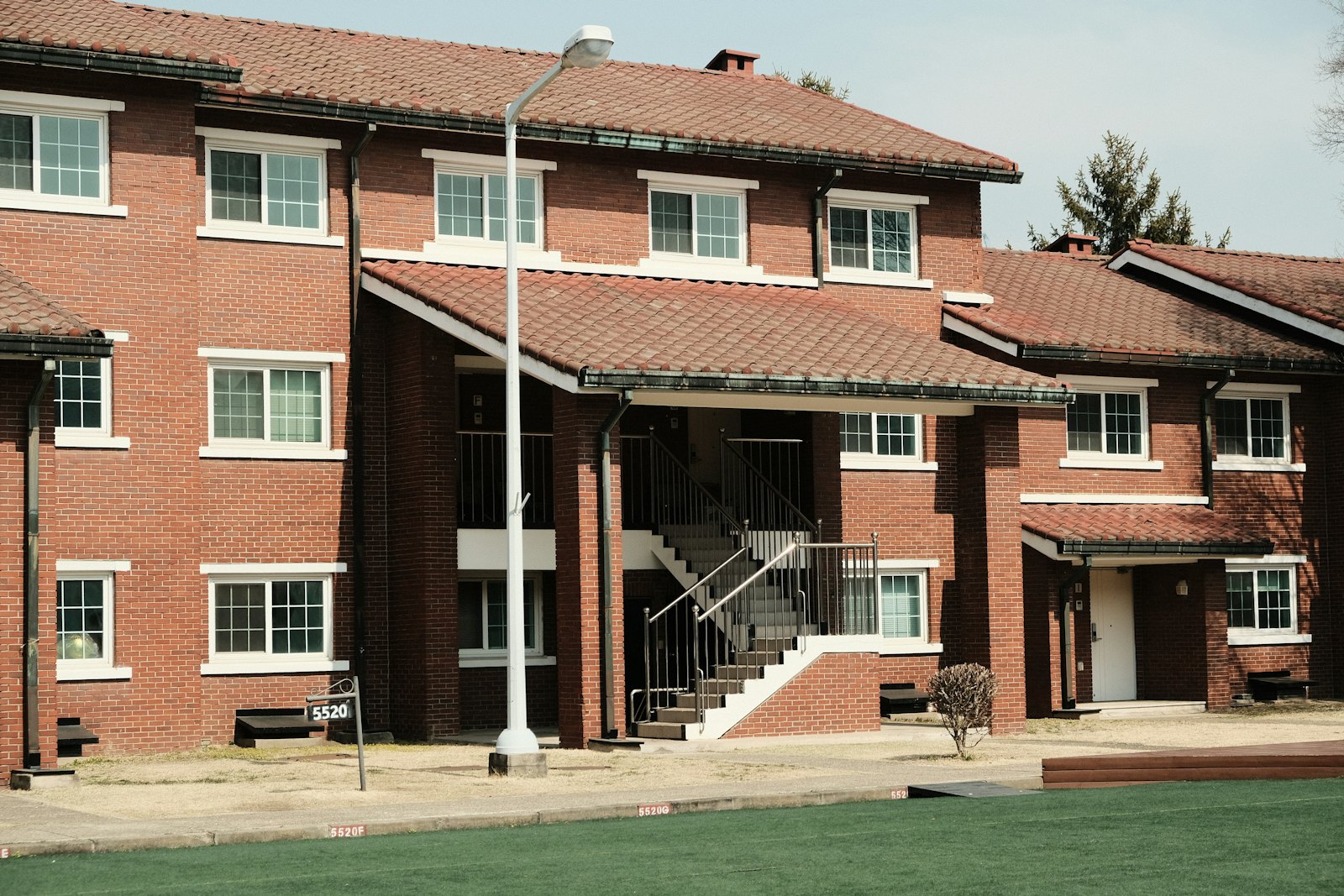 Brick apartment building with exterior stairs