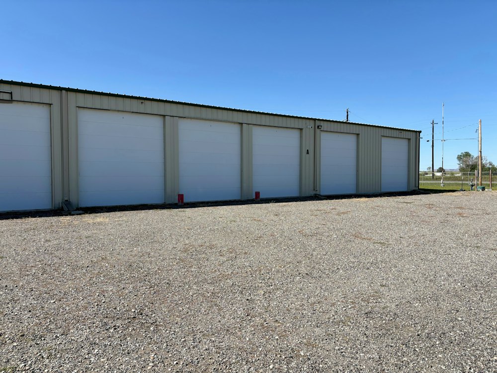 Self-storage building with roll-up doors